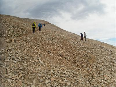 Trail climbing steeply from the saddle